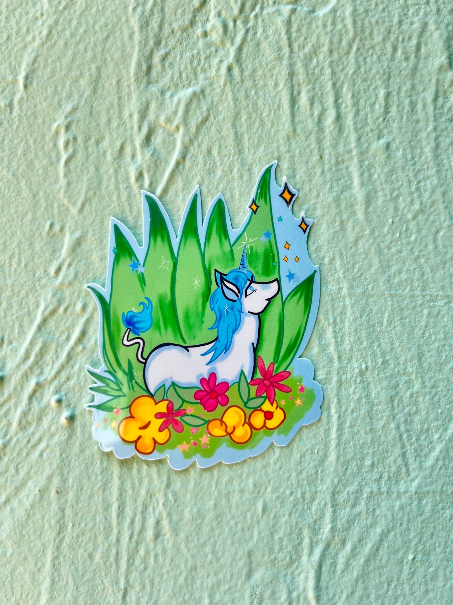 Blue Unicorn Resting Among the Flowers Glossy Sticker