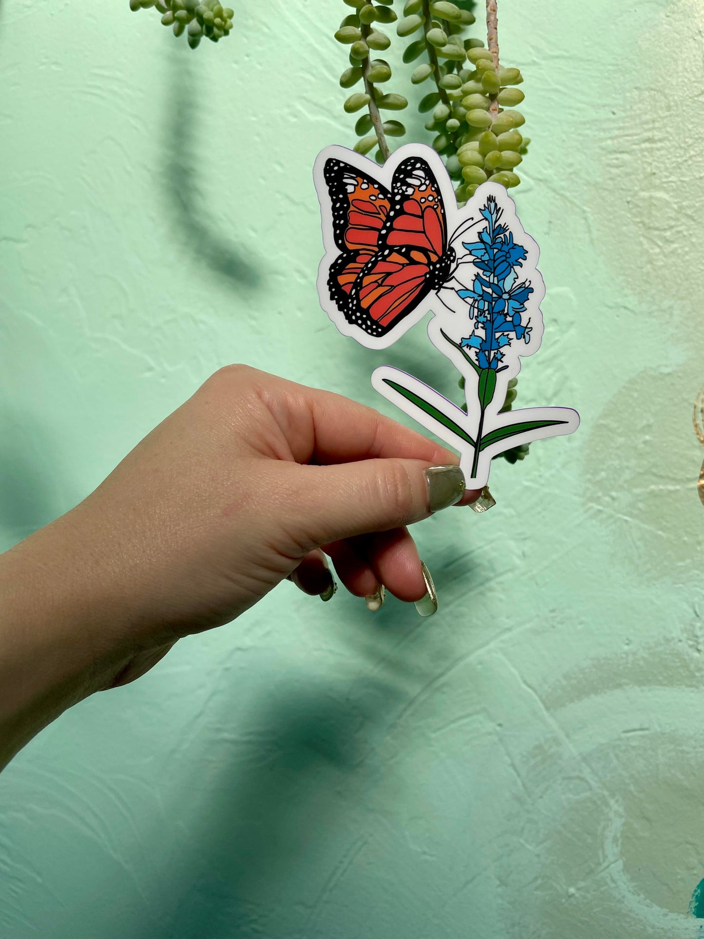 Monarch Butterfly on Blue Flower Glossy Vinyl Sticker