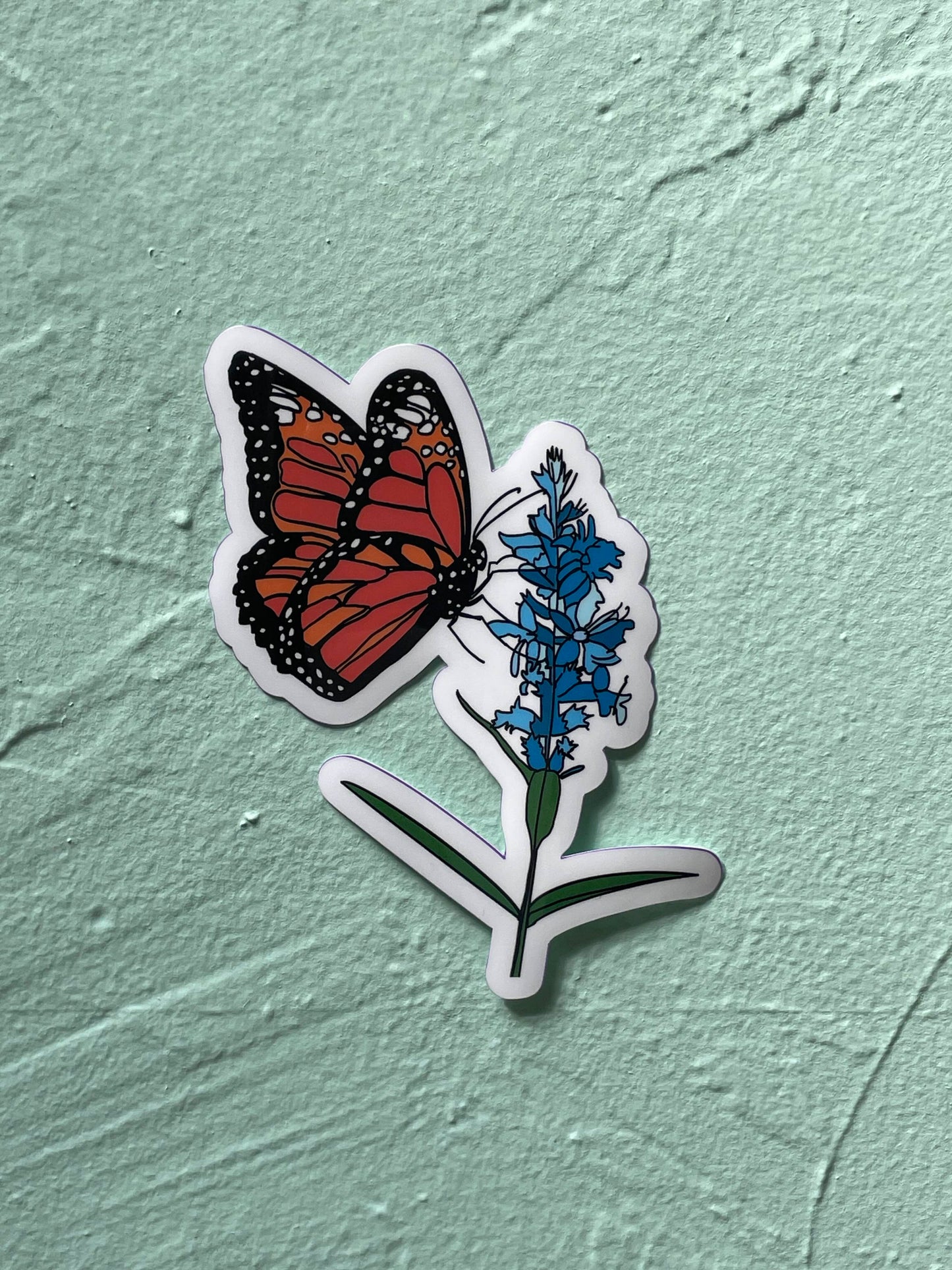 Monarch Butterfly on Blue Flower Glossy Vinyl Sticker