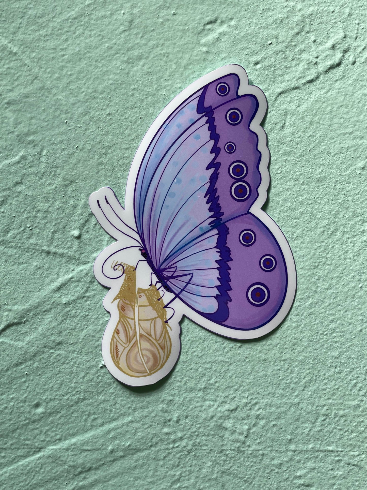 Purple Butterfly Emerges from a Cocoon Glossy Vinyl Sticker