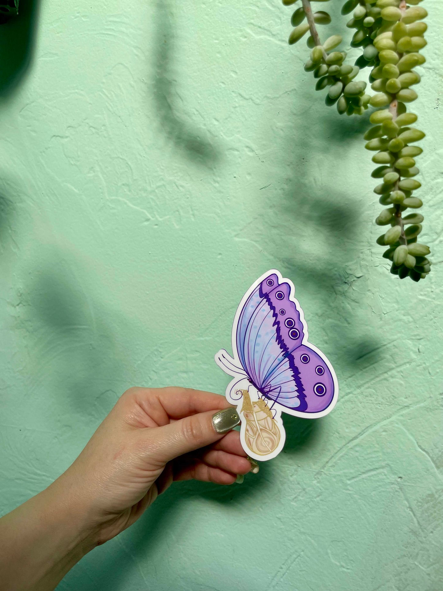 Purple Butterfly Emerges from a Cocoon Glossy Vinyl Sticker
